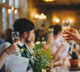 Two wine glasses with sparkling wine in a celebratory toast